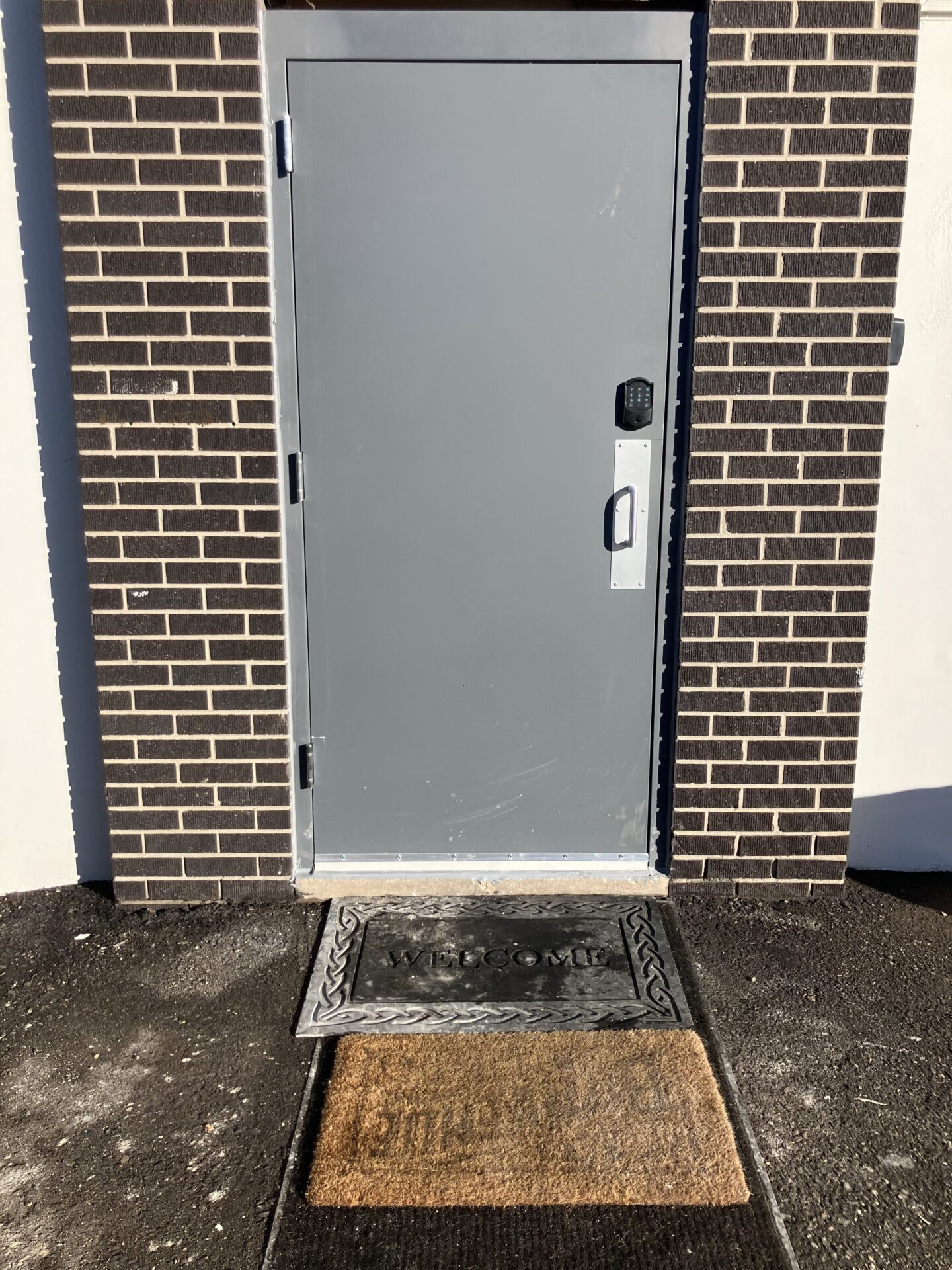 Newly installed commercial door with keypad lock by Excel Locksmith Denver.